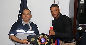  Eric Ltigo gano  el ttulo Fedecentro de peso sper pluma de la Asociacin Mundial de Boxeo AMB al colombiano Eduard Marriaga