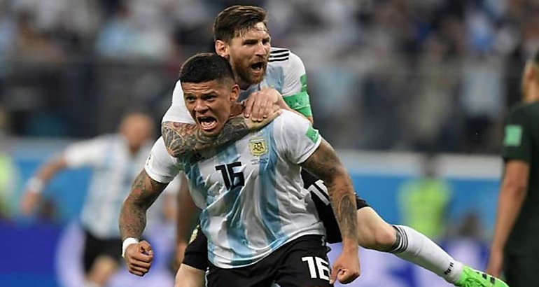 Lionel Messi y Marcos Rojo